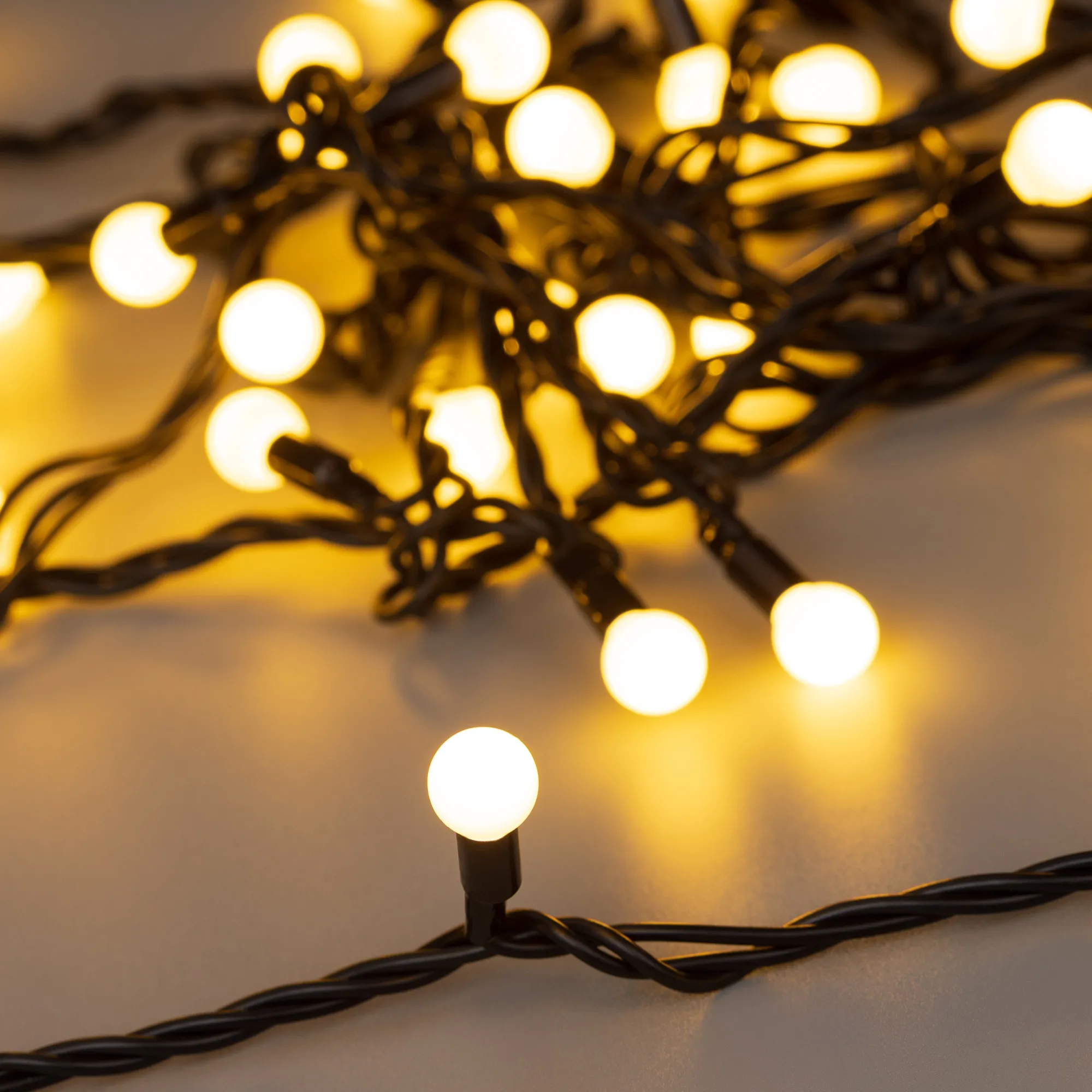 Светодиодная гирлянда ARD-BALL-CLASSIC-D13-10000-BLACK-100LED WARM (230V, 7W) (Ardecoled, IP65) - изображение товара